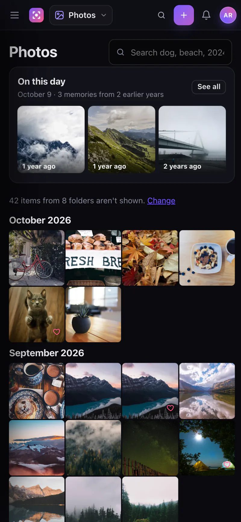 Stavo Photos on an iPhone-sized screen showing a photo grid.
