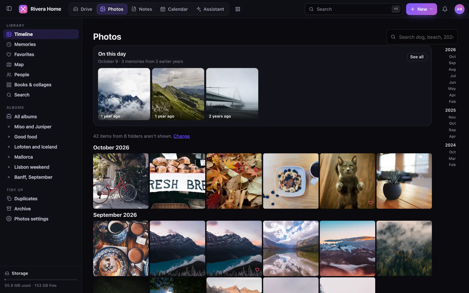 The Photos timeline: a grid of landscape and travel photos grouped by day.